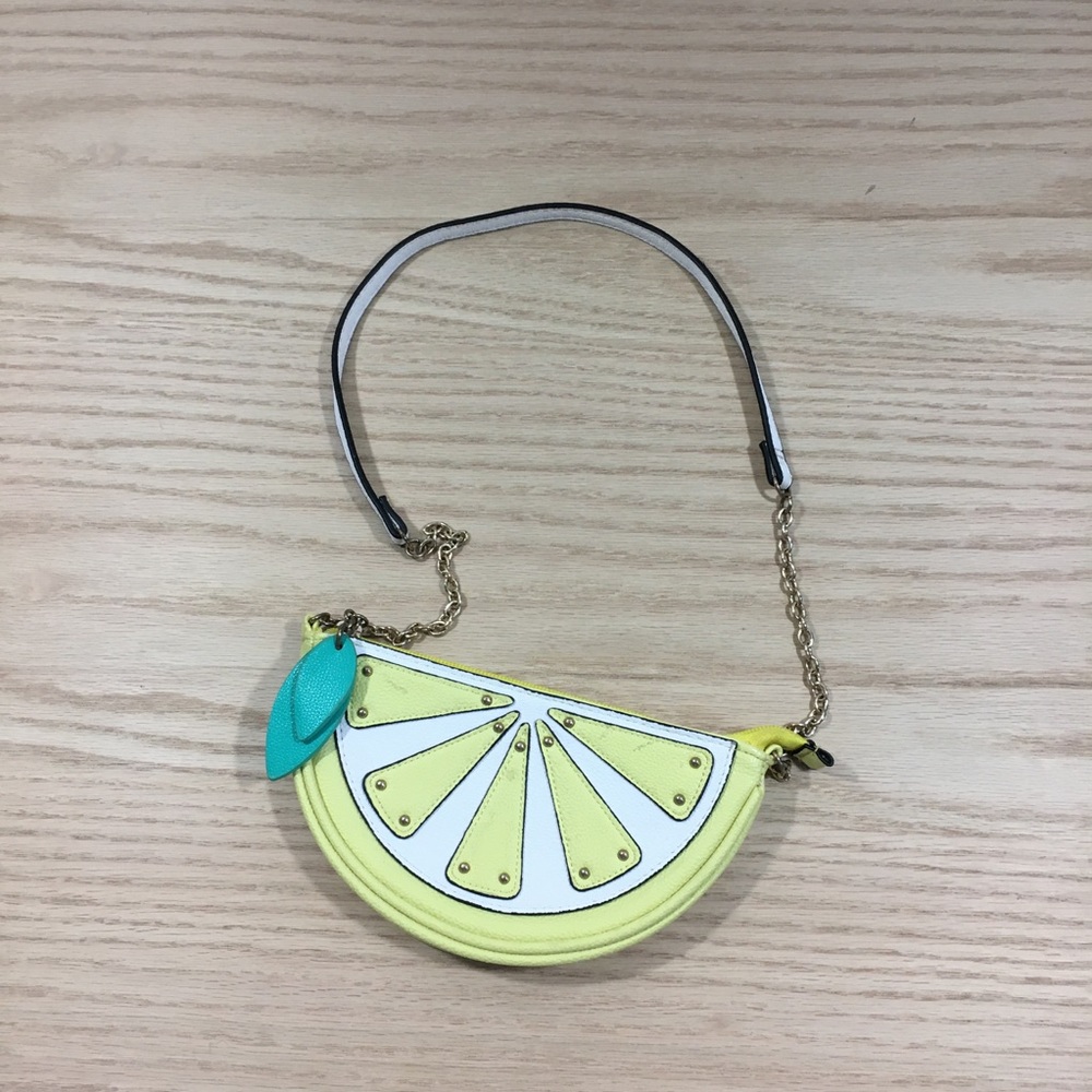 Yellow lemon wedge hand shoulder purse
